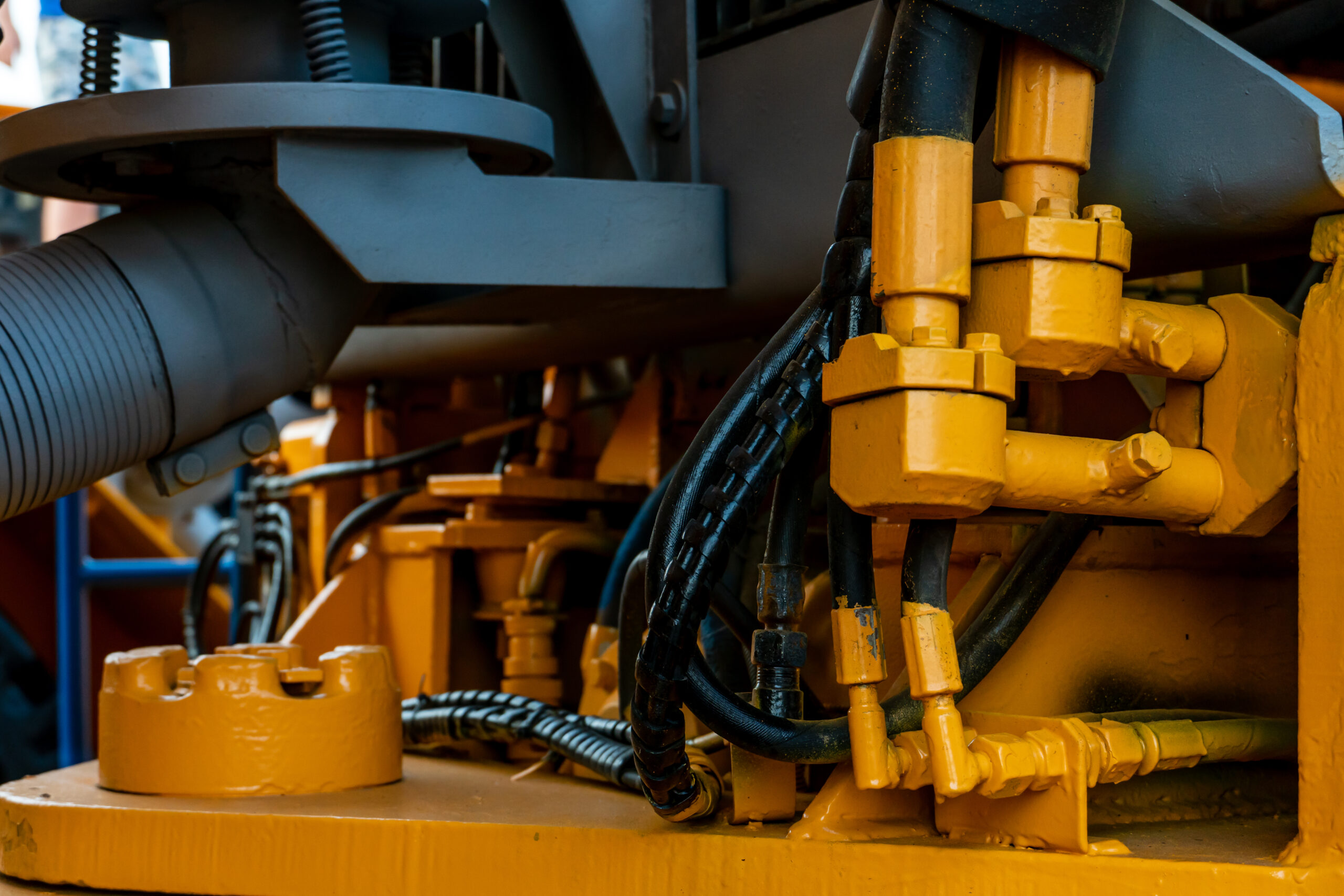 Details of a large quarry bulldozer. Exhibition of cars, tractors, dump trucks and other equipment for the mining industry. Spare parts of construction machinery.